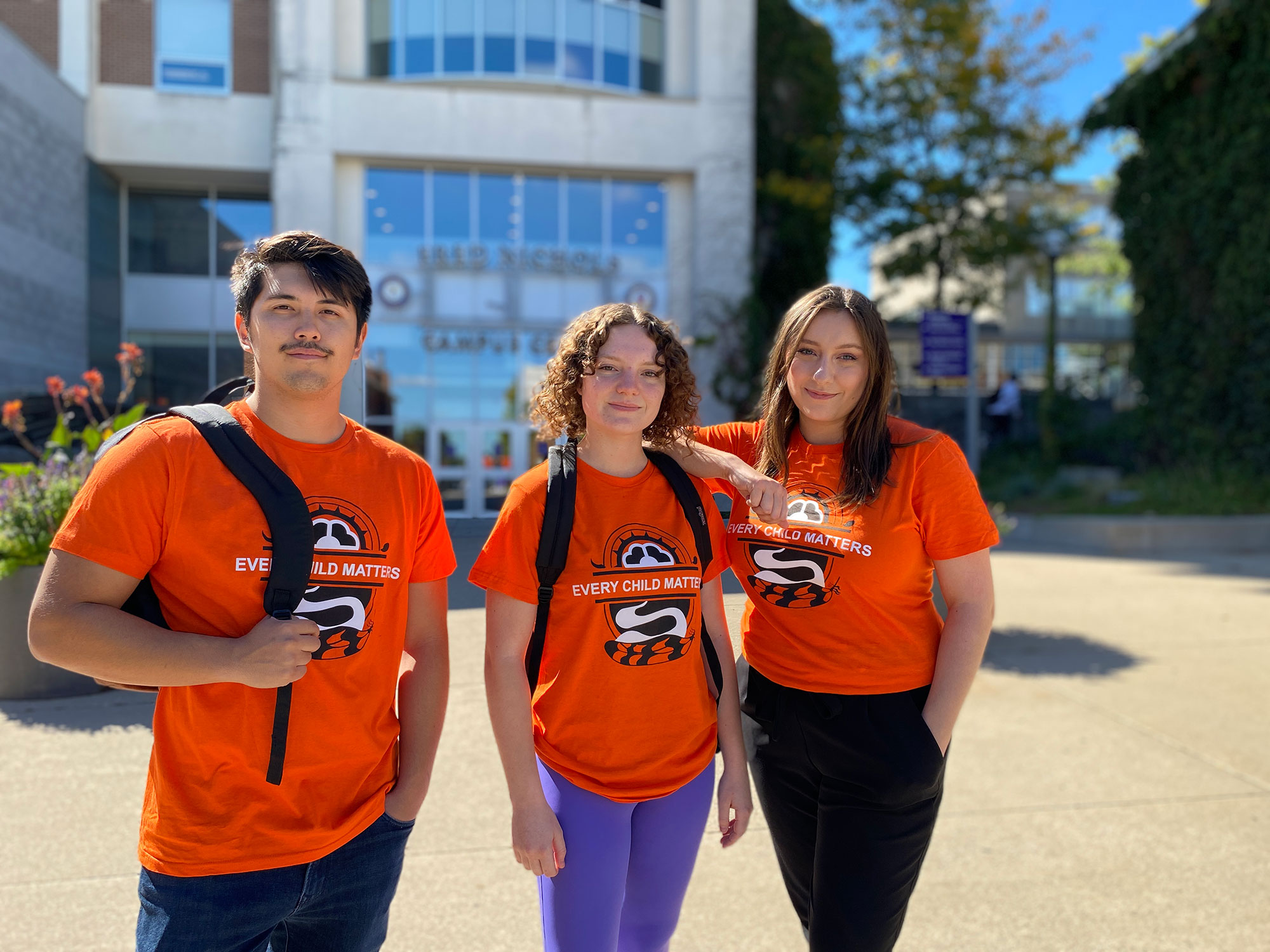Students wear orange shirts
