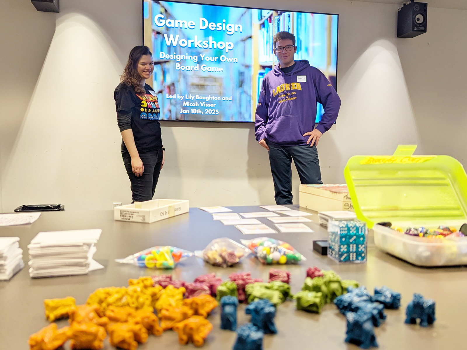 Laurier students Lily Boughton and Micah Visser present a board game design workshop