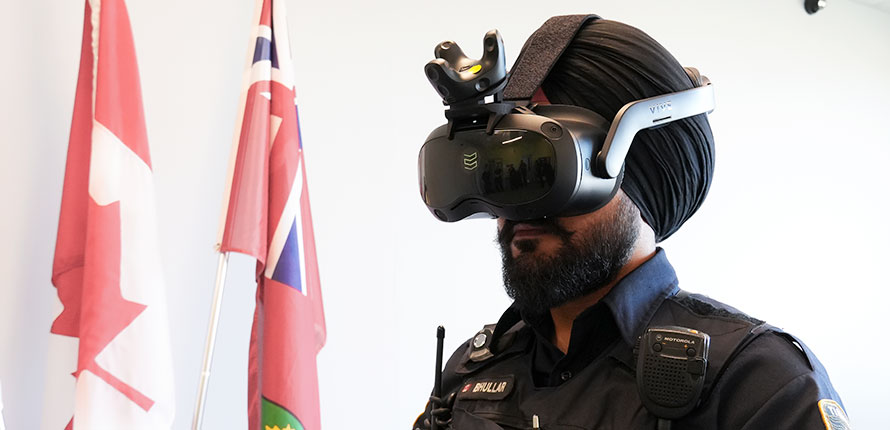 Police officer wearing virtual reality headset